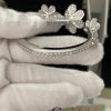 Van Cleef & Arpels Frivole bracelet, 7 flowers, medium model 18K white gold, Diamond VCARPDYB00